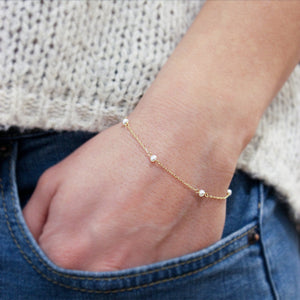 BRACCIALE CON MINI PERLE - ORO18KT